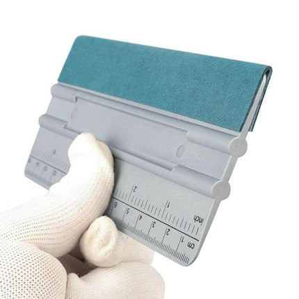 Auto Film and Wallpaper Scraper Tool with Graduated Scale — felt-edged scraper with inch/cm ruler for precise film, window and wall removal (gloved hand)