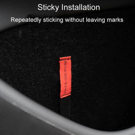 Door Emergency Pull Cord For Tesla Model Three And Y - red nylon emergency pull tab installed on interior door pocket for manual exit