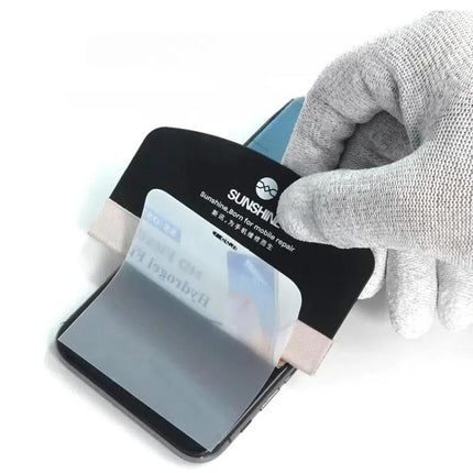 SUNSHINE Hydrogel Film Screen Scraper Card for Mobile Devices being used to apply a hydrogel screen protector on a smartphone for smooth, bubble-free installation