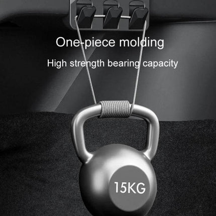 Hidden Trunk Hook for Tesla Model Y Foldable Car Organizer installed in trunk holding a 15KG kettlebell to show high strength bearing capacity