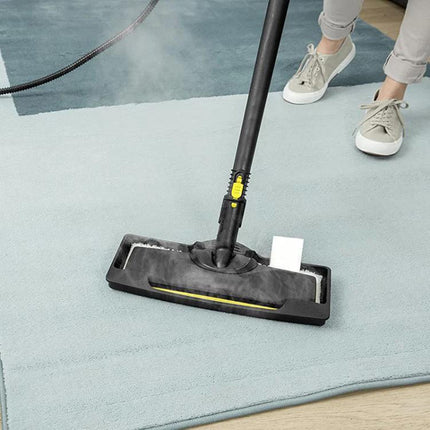 Karcher Steamer Frame Accessory for Carpet and Floor Cleaning cleaning a light blue rug with steam and attached Karcher cleaner