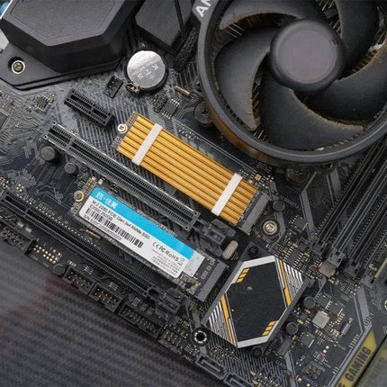 FinalCool Aluminum Heat Sink for M.2 2280 SSDs in Gold installed on motherboard next to M.2 SSD and CPU cooler