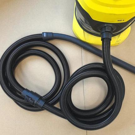 Extension Hose for Karcher NT and WD Series Vacuums, 2.5 Meters - black ABS extension hose coiled beside yellow Karcher vacuum