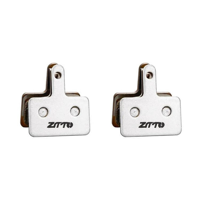 Metal Sintered Disc Brake Linings For Mountain Bikes - pair of silver sintered brake pads with mounting tabs, durable copper-tin composite, high-wear performance