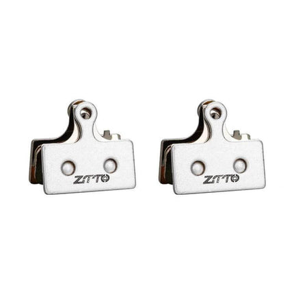 Metal Sintered Disc Brake Linings For Mountain Bikes - pair of silver sintered brake pads with copper-tin composition for reliable off-road and city braking