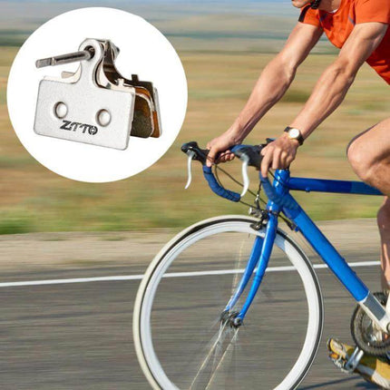 Metal Sintered Disc Brake Linings For Mountain Bikes shown with sintered brake pads and a cyclist on a road-to-trail ride