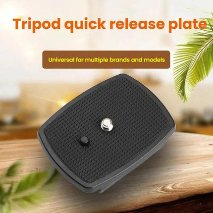 Quick Release Plate for Attaching Smartphone and DSLR Cameras to Tripods on wood surface, universal quick release plate for fast device switching