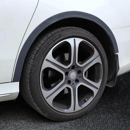Self-Adhesive Protective Trim for Car Wheel Arches and Door Edges installed on a car wheel arch to protect from scrapes and curb impacts