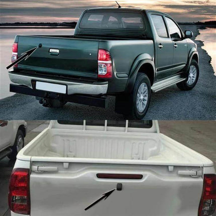 Vehicle Reversing Camera for 2010-2017 Toyota Hilux Models installed on pickup tailgate showing camera location and improved rear visibility