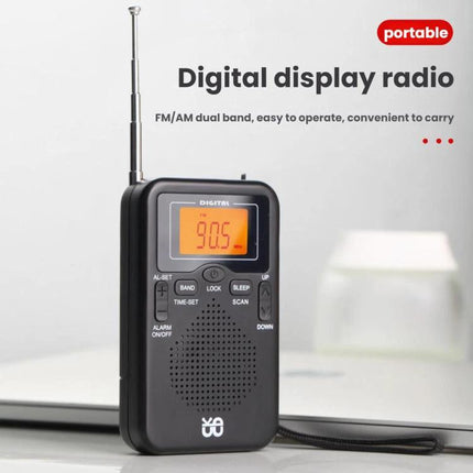 Compact Portable FM/AM Stereo Radio with Digital Clock and Speaker - compact black portable radio with digital display, speaker and telescopic antenna