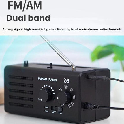 Portable Dual-Band FM and AM Radio with External Power Socket compact black ABS receiver with antenna, manual tuning knobs and external power socket for travel