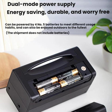 Portable Dual-Band FM and AM Radio with External Power Socket showing battery compartment and external power socket option on countertop