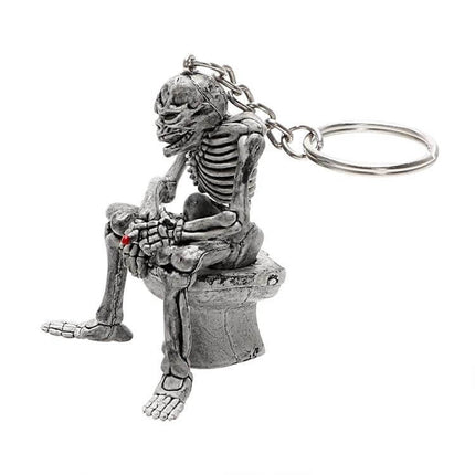 FORAUTO Skull Car Key Ring For Key Fob And Bag Decor - rubber skull keychain sitting on toilet decor, 5.4cm x 4.4cm, durable flexible 17g