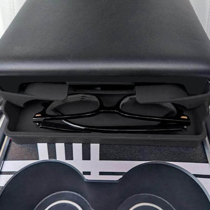 Silicone Armrest Glasses Storage Pocket for Tesla Cars holding black eyeglasses under center console armrest, nano-adhesive mounted, no-residue silicone pocket