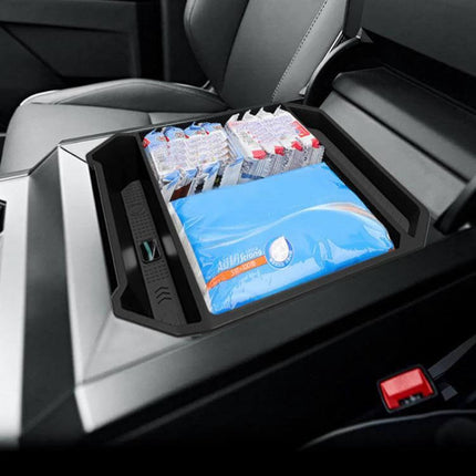 Tesla Cybertruck Center Console Storage Box Keeps Essentials Organized — plastic tray organizing wipes, drinks and cables in center console