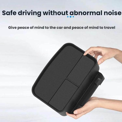 Removable Dashboard Tray ETC Holder for Tesla Highland - black silicone tray held in hands for secure, residue-free dashboard storage