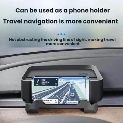 Removable Dashboard Tray ETC Holder for Tesla Highland shown holding a phone for navigation on the dashboard, silicone non-damaging snap-in fit