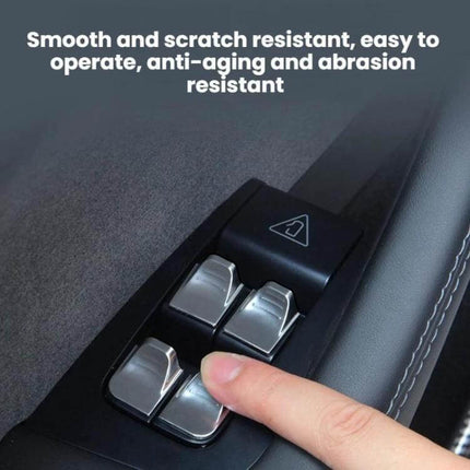 Tesla Model Y Juniper Window Lift Button Sticker Set on driver door panel showing ABS molded silver button covers