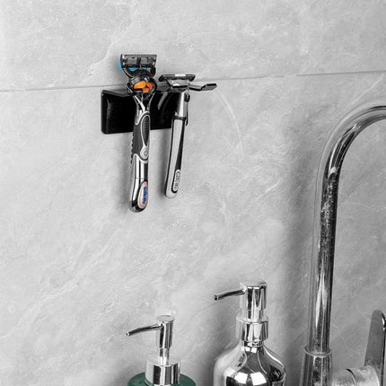 Acrylic Storage Stand for Daily Bathroom Razor Organization holding two razors on a tiled bathroom wall near sink and soap dispensers