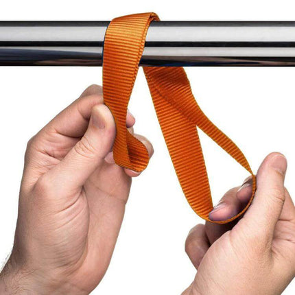 Multi-Purpose Luggage Straps for ATVs and Motorcycles - orange PP webbing strap looped around metal bar being secured by hands