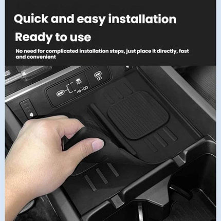 Anti-Slip Wireless Charging Silicone Mat For Hyundai Santa Fe shown installed in 2024 Santa Fe center console with hand placing the anti-slip mat