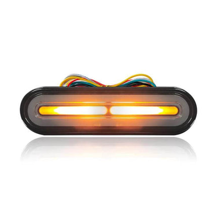 Brake Tail Light For Electric Bikes With Turn Signals in smoked black lens showing running brake and amber turn signal LED
