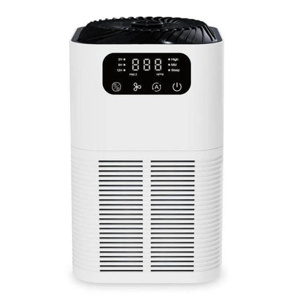 Desktop Aromatherapy Diffuser and Air Purifier With Negative Ions on a desk, compact white unit with digital display and vents