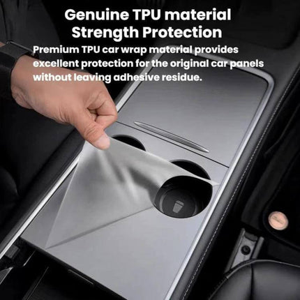 Tesla Model Y Central Control Panel Protective Film Transparent - clear TPU protector being applied to center console to prevent scratches and wear