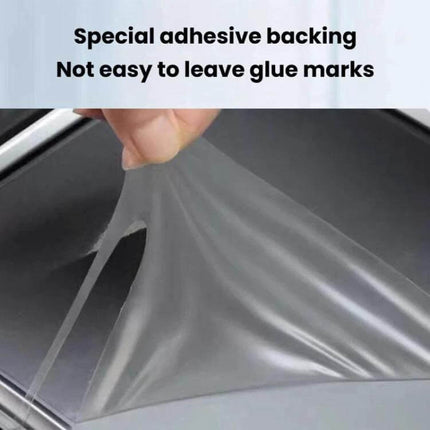 Tesla Model Y Central Control Panel Protective Film Transparent shown peeled to highlight special adhesive backing and clear TPU protection