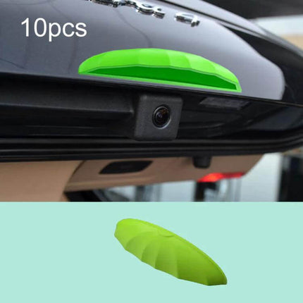 Silicone Rain Shield for Car Reverse Cameras, 10 Pack - lime green silicone rain guard installed above rearview camera to keep lens clear in wet weather