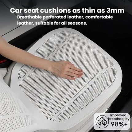 Breathable Car Seat Cushion For Everyday Comfort On The Go - white ventilated perforated car seat cover showing hand testing breathable holes