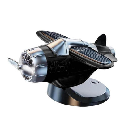 Solar-Powered Car Dashboard Airplane Ornament That Rotates in Sunlight – compact silver airplane dashboard ornament with solar panels and spinning propeller