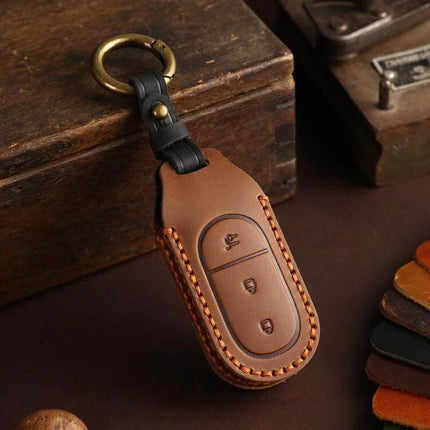 Hallmo Genuine Leather Car Key Cover for Leapmotor Keys in brown cowhide leather with brass keyring protecting three-button key