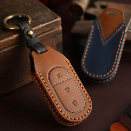 Alt Tag: Hallmo Genuine Leather Car Key Cover for Leapmotor Keys in brown cowhide with stitched edges protecting buttons and keyring attachment