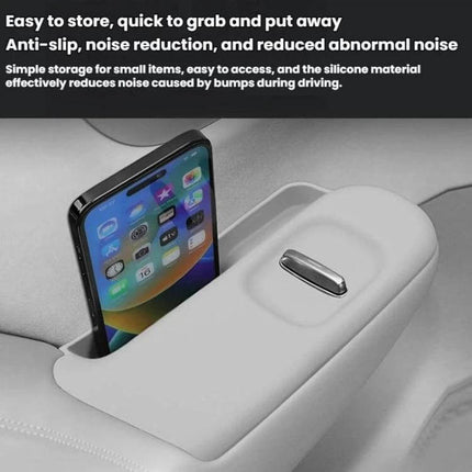 Leapmotor B10 Left-Hand Drive Car Glass Lift Panel Anti-Slip Pad shown holding a phone in the silicone anti-slip storage pad