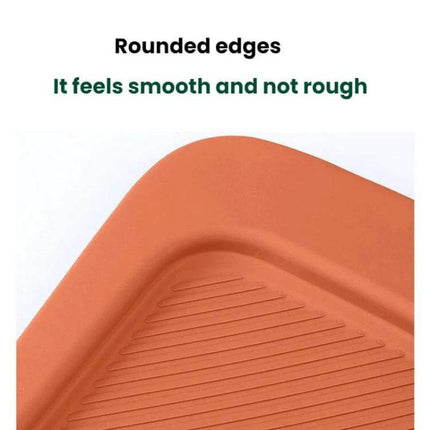 Leapmotor Silicone Cup Protector Mat for Car Interior orange silicone mat with rounded edges and textured surface, waterproof and scratch-resistant