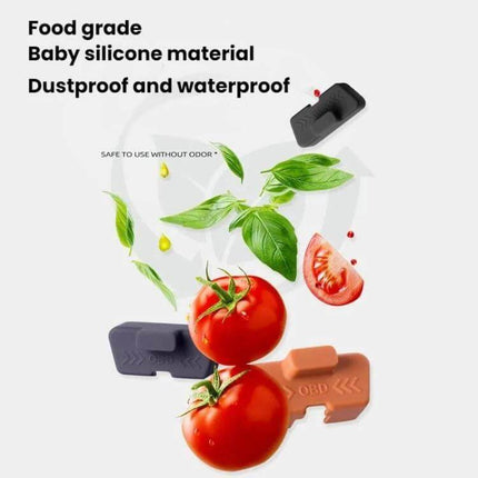 Leapmotor Silicone OBD Dust Cover For Vehicle Port black and brown silicone dust caps shown with tomatoes and basil, food-grade, dustproof