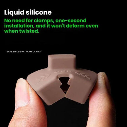 Leapmotor Silicone OBD Dust Cover For Vehicle Port - brown liquid silicone dust cap held between fingers, flexible one-second slip-on design