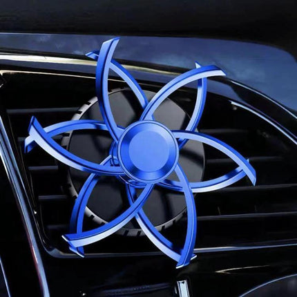 Car Air Vent Ornament Rotating Snowflake With Fragrance Pad mounted on car vent, blue rotating snowflake air freshener