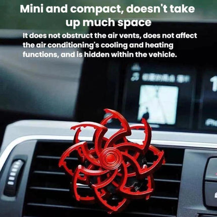 Car Air Vent Ornament Rotating Snowflake With Fragrance Pad red rotating snowflake clipped to car vent, compact design that doesn't block airflow