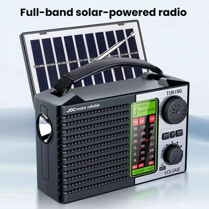 JOC Portable Solar Radio with Built-in Flashlight and Bluetooth shown with solar panel, AM/FM/SW dial, tuning and volume knobs