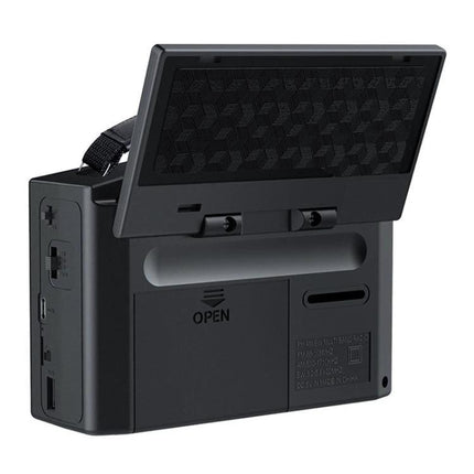 JOC Portable Solar Radio with Built-in Flashlight and Bluetooth showing rear view with solar panel tilted, carrying strap and ports