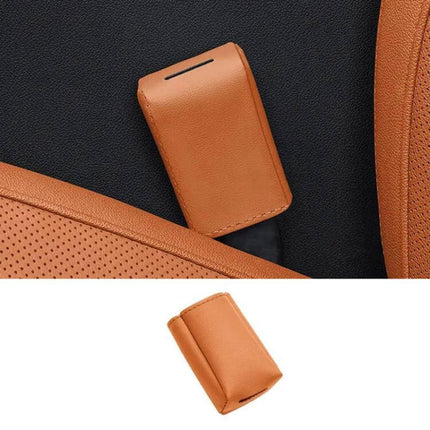 Leather Car Seat Belt Buckle Protector for Everyday Use shown in tan leather installed on car seat to prevent scuffs and reduce noise