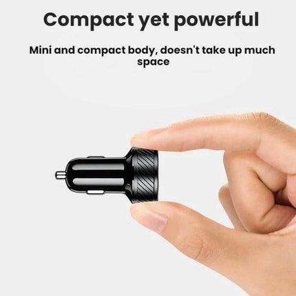 Car Cigarette Lighter USB Charger With LED Indicator And Switch — compact aluminum alloy in-vehicle USB charger showing tiny black charger held between fingers