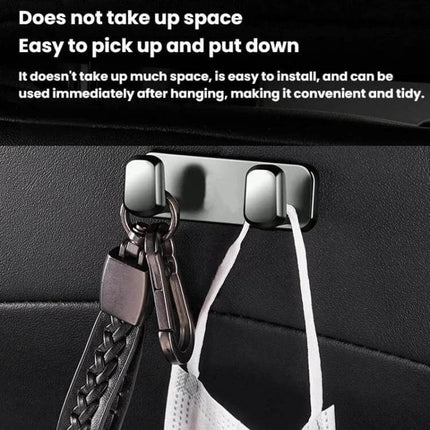 Car Front Seat Zinc Alloy Adhesive Hook For Cables And Bags hung on car seat holding keys and a mask, compact rounded-edge zinc alloy organizer