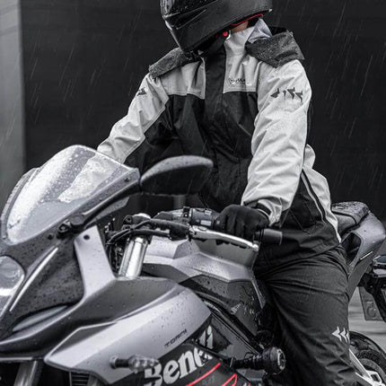 Outdoor Oxford Fabric Motorcycle Rain Suit With Detachable Hood worn by rider on sportbike in rain, TPU membrane and lotus leaf waterproof coating