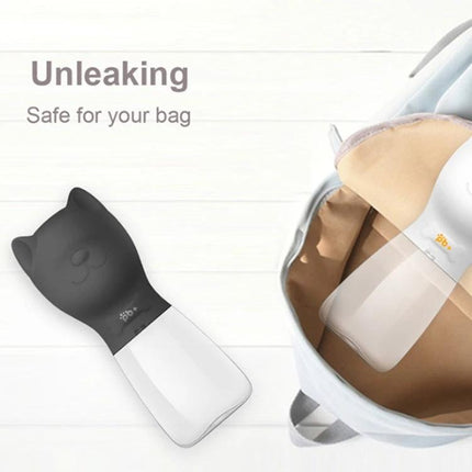 Convenient Water Dispenser for Pets on Outdoor Trips - compact unleaking portable bottle with attached bowl shown next to backpack
