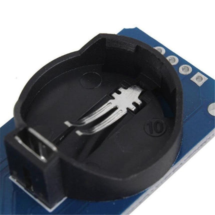 Real-Time Clock Module for Electronic Projects and Devices DS3231 coin cell battery holder close-up, backup power contact