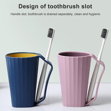 Bathroom Cup for Daily Toothbrushing with Handle shown in blue and pink with built-in toothbrush slot and comfortable grip