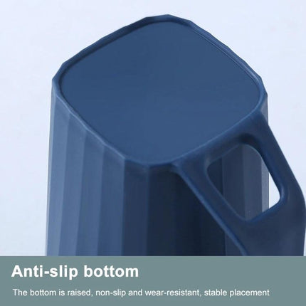 Bathroom Cup for Daily Toothbrushing with Handle showing anti-slip raised bottom and ergonomic handle for stable, clutter-free sink organization